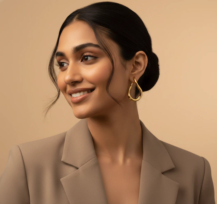 Golden Fluid Curve Hoop Earrings